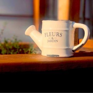Ceramic watering can decoration